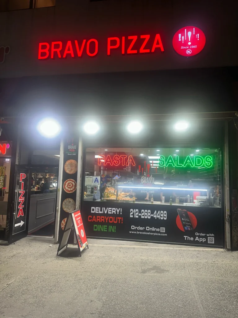 arafed pizza restaurant with neon signs and signage for bravo pizza